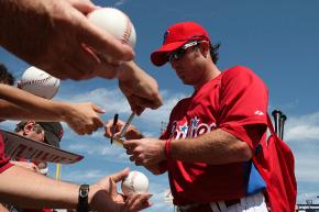 Chase Utley signs autographs in Clearwater.